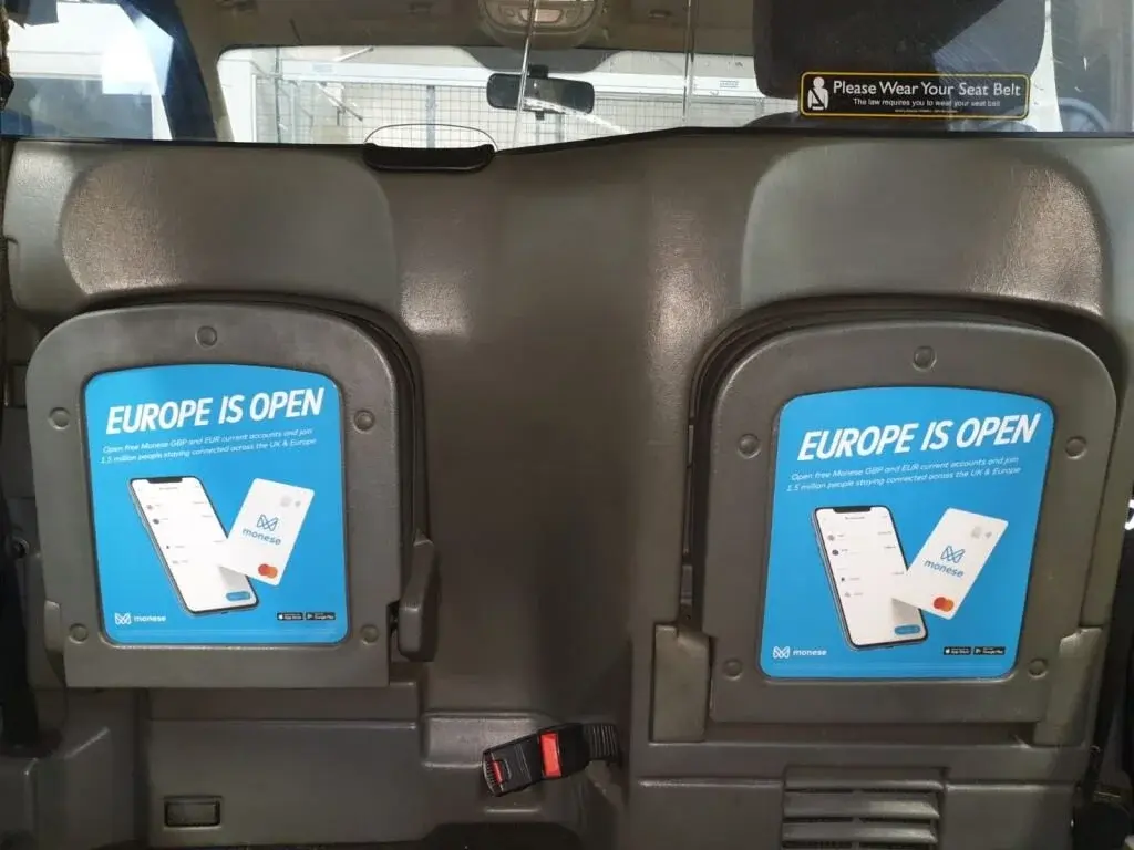 Monese Europe is Open advertising displayed inside a London taxi